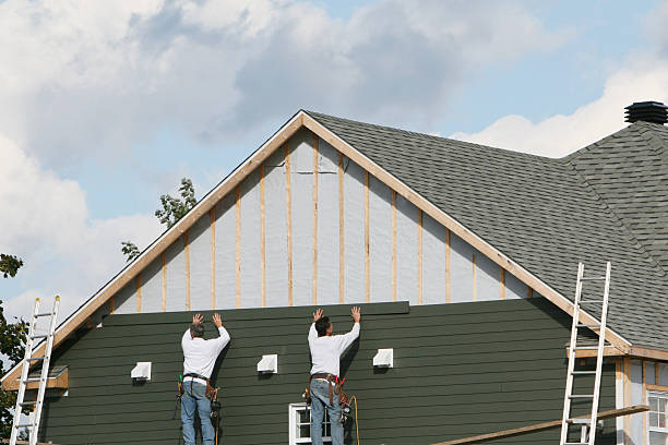 Professional Siding Installation technician working in Millersburg, OR